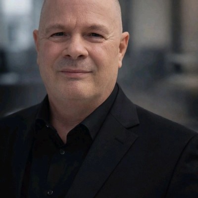 Professional profile photograph of Paul D. Adams Jr., executive technology leader
